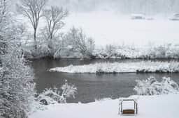 Caboose Tiny Home on river with hot tub near Stowe