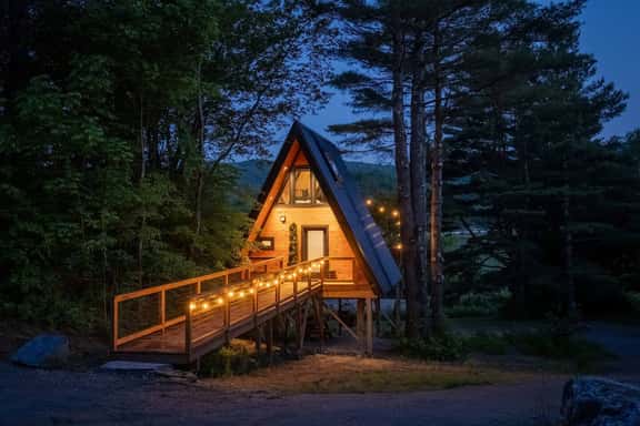 Designer A-Frame Treehouse with hot tub on river - Image 1