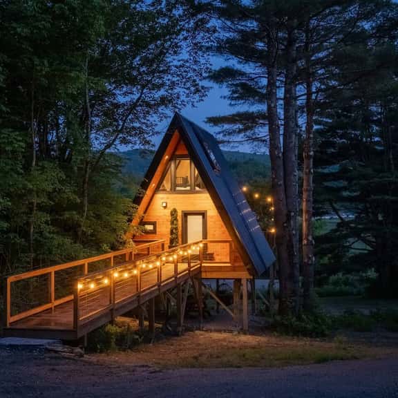 Designer A-Frame Treehouse with hot tub on river - Image 1